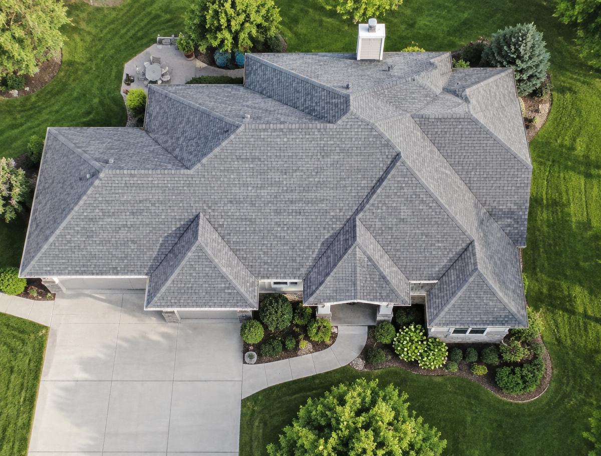 Aerial view of a clean gray shingle roof on a Florida home